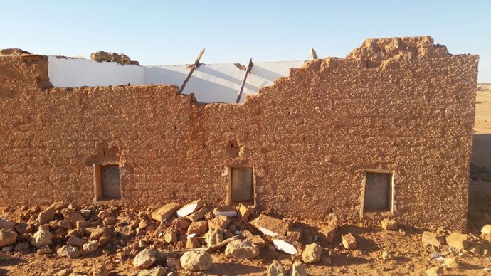 Casa derruida en un campamento de refugiados.