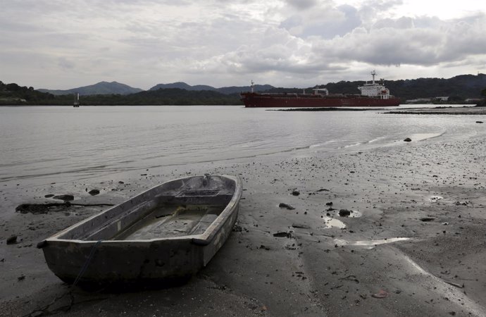 Cargo ship navigates on the pacific side of the Panama Canal in Panama City