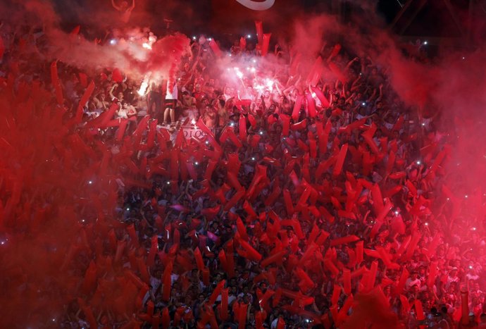 River Plate's fans light flares as they cheer before the Copa Sudamericana secon