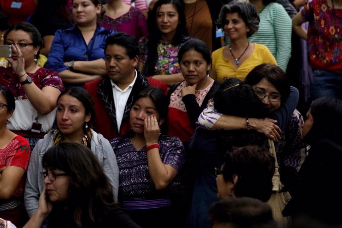 People react after a verdict was given in the Sepur Zarco case in Guatemala City