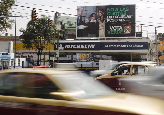 A billboard of the PVEM, a small party supporting President-elect Pena Nieto, is