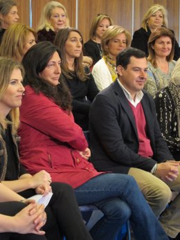 Juanma Moreno en un acto con motivo del Día de la Mujer