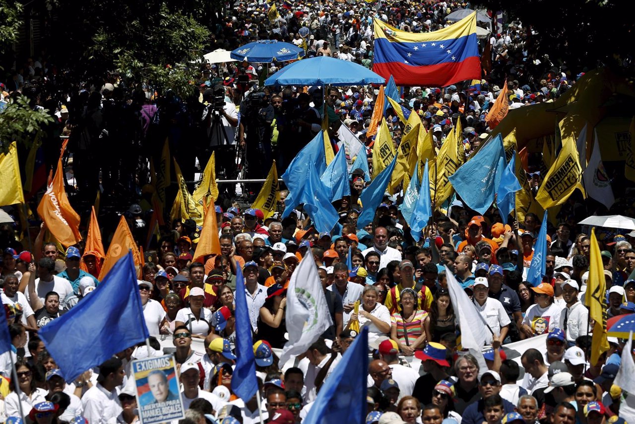 Opposition supporters take part in a rally against Venezuela's President Nicolas
