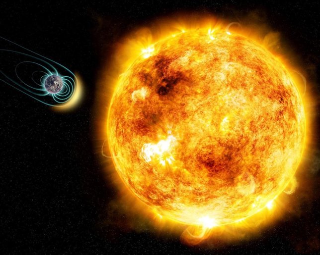 Estrella como el sol joven y planeta con campo magnético