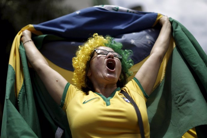 A demonstrator attends a protest against Brazil's President Dilma Rousseff, part