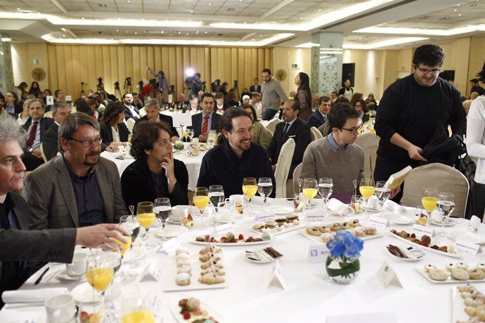 Pablo Iglesias e Iñigo Errejón en el desayuno de Europa Press con Ada Colau