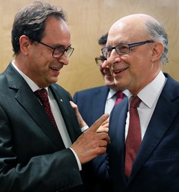 El ministro de Hacienda, Montoro, y el conseller Soler