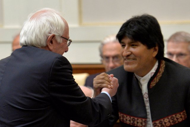 U.S. Democratic presidential candidate Sanders shakes hands with Bolivia's presi
