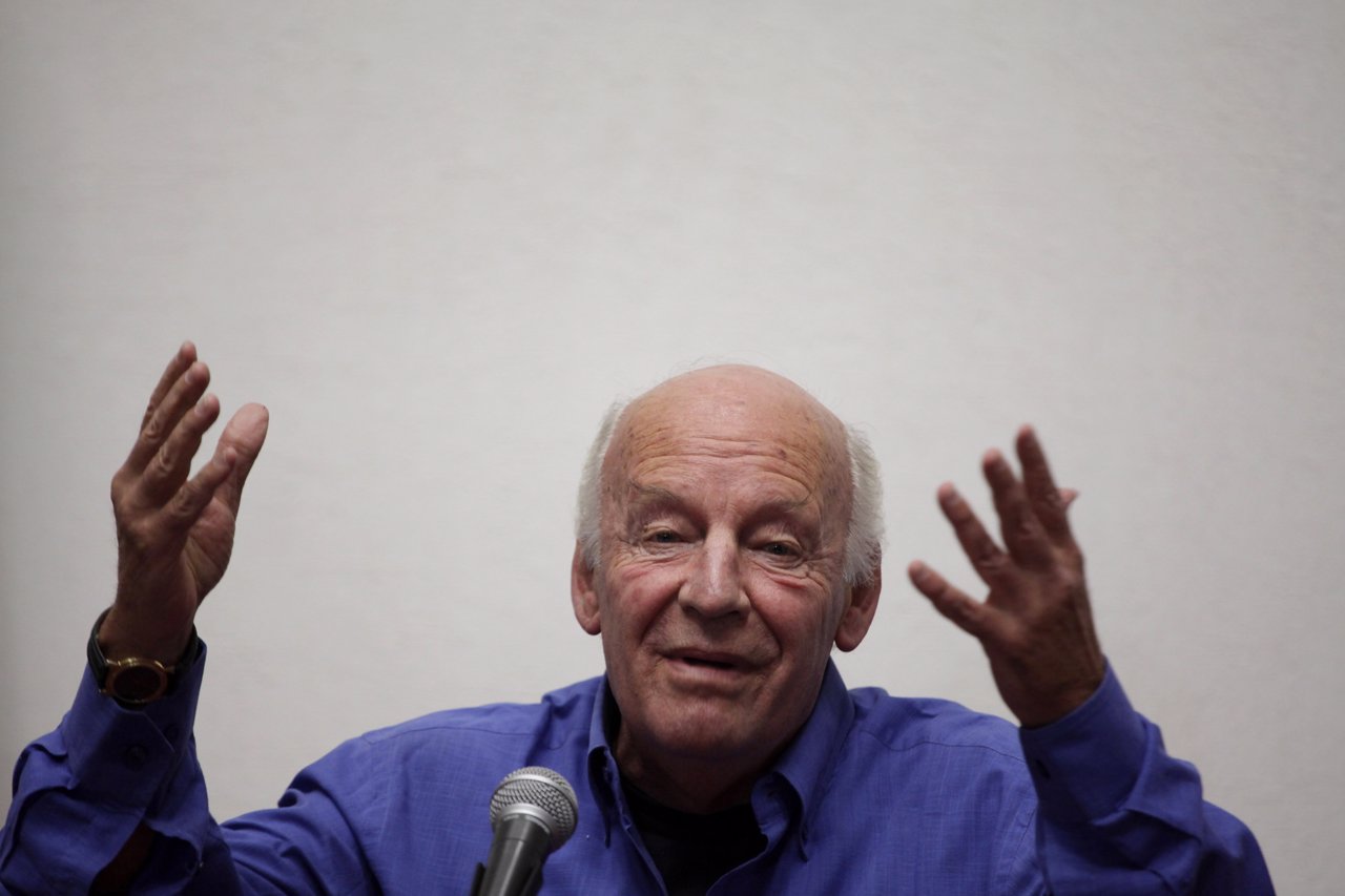 Uruguayan writer Eduardo Galeano gestures while addressing the audience at the m