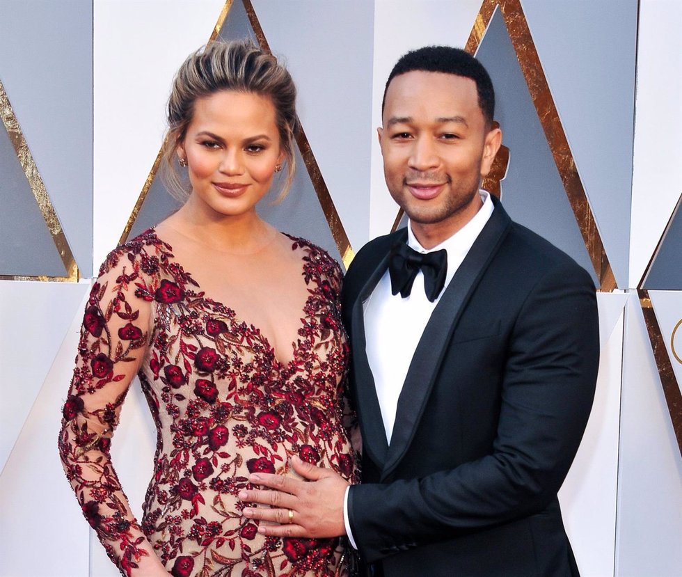 Chrissy Teigen and John Legend arriving at the 88th Academy Awards Ceremony held