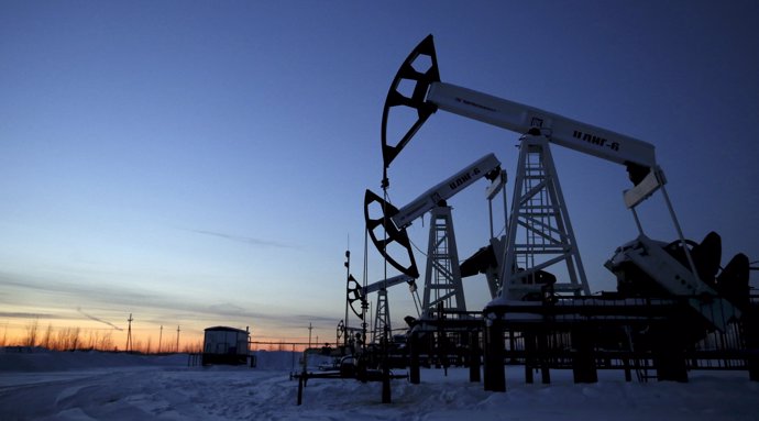 File photo of pump jacks at Lukoil company owned Imilorskoye oil field outside W