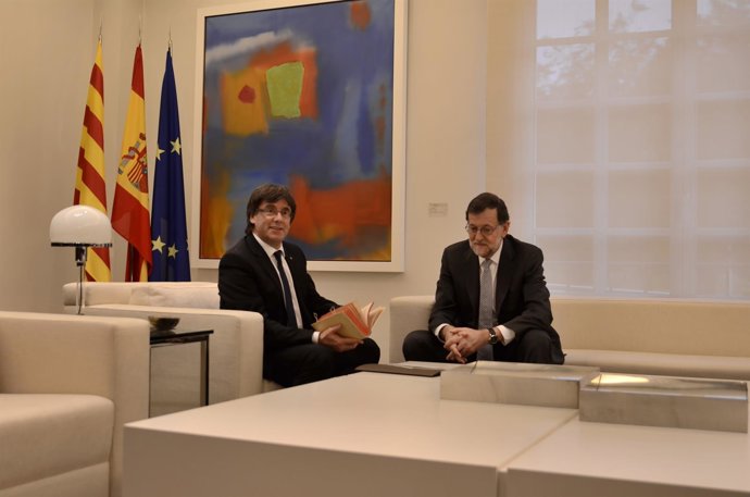 Mariano Rajoy y Carles Puigdemont