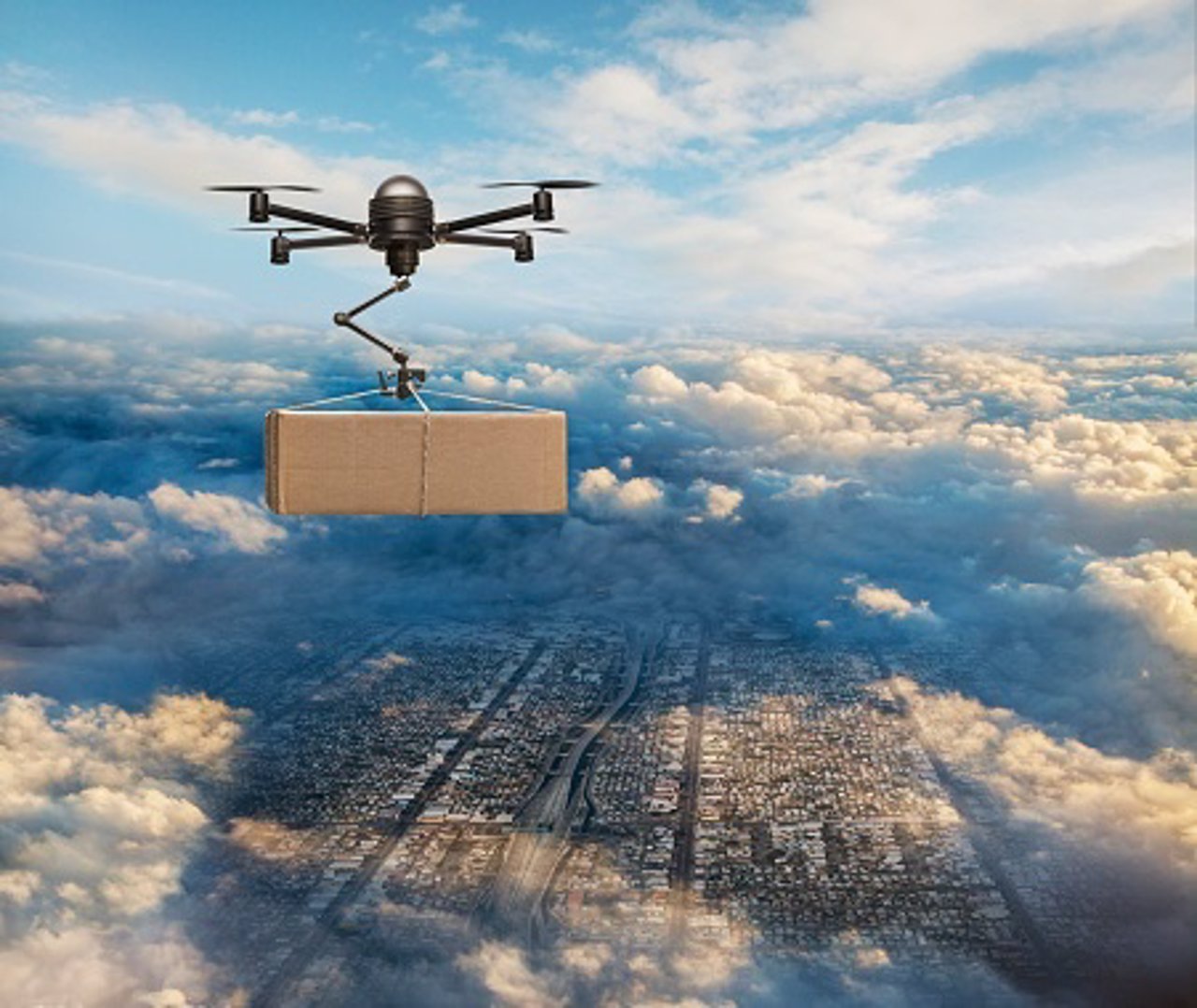 Drone delivering package over cityscape