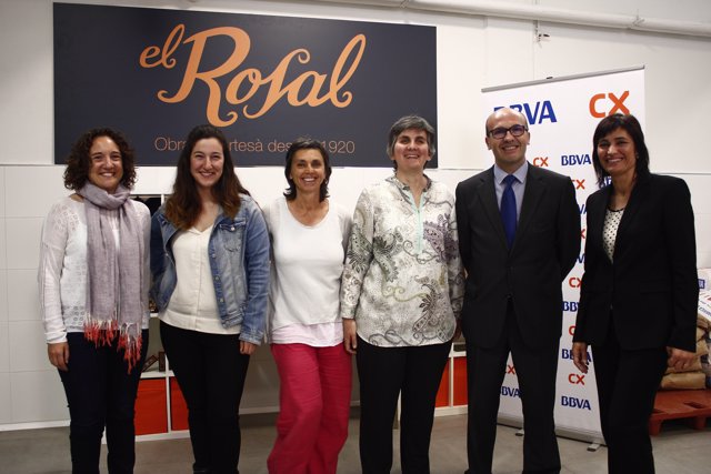 Firma del convenio entre CatalunyaCaixa y la Associació Alba