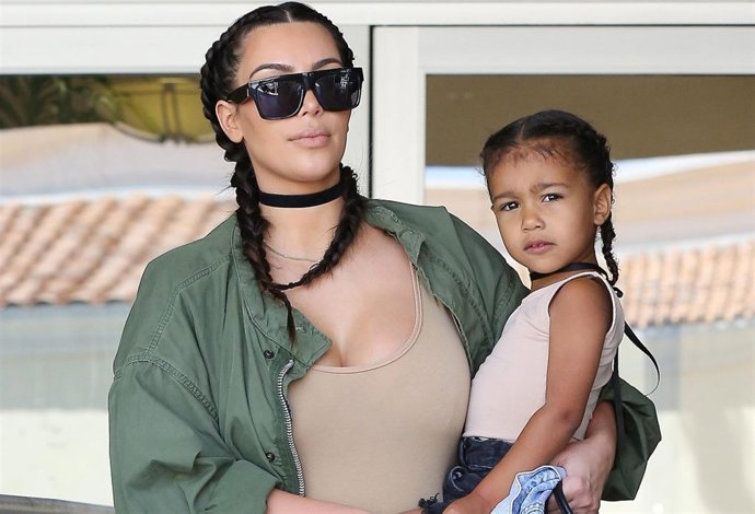 Studio City, CA - Kim Kardashian and North West rock matching braids during some
