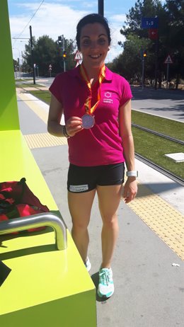 Loreto Pacho con su medalla