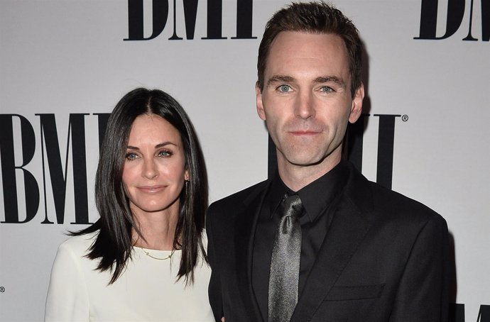 Courteney Cox and Johnny McDaid attend the 64th Annual BMI P