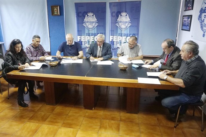 Firma de la subida salarial