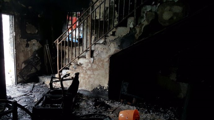 Estado de una vivienda de Jaén tras un incendio con cuatro fallecidos