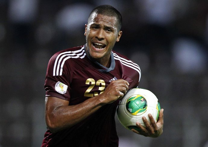 Venezuela's Rondon celebrates scoring against Peru during their 2014 World Cup q