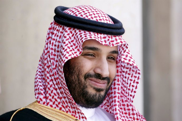 Saudi Arabia's Deputy Crown Prince Mohammed bin Salman reacts upon his arrival a