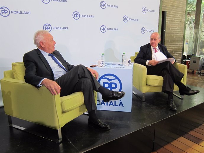 Ministros José Manuel García-Margallo y Jorge Fernández Díaz