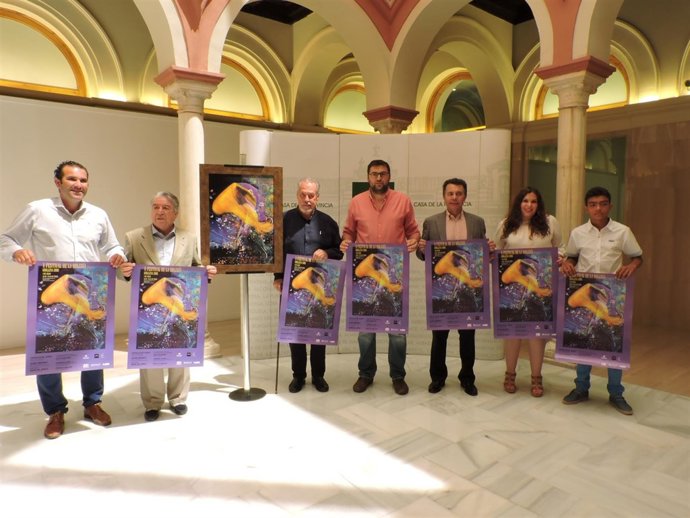 Presentación del cartel y del programa del evento.