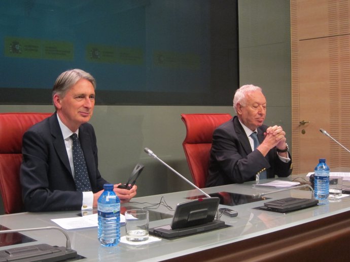 Philip Hammond y Jose Manuel García-Margallo