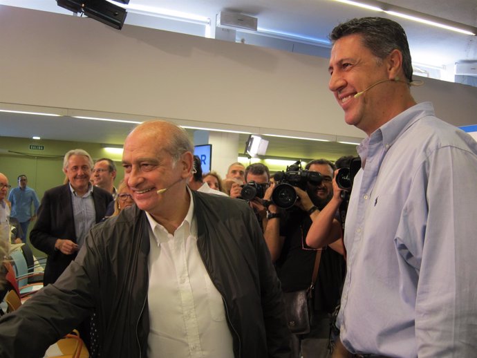 El candidato del PPC, J. Fernández Díaz, y el coordinador del PP García Albiol 
