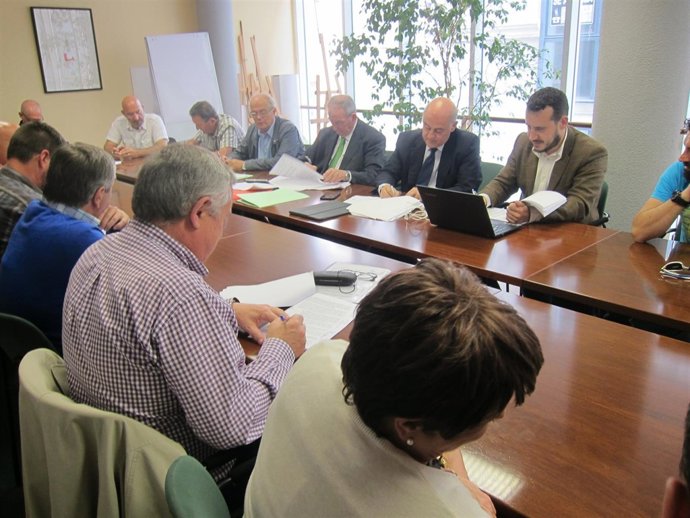 Firma del acuerdo laboral de Sniace en el Orecla