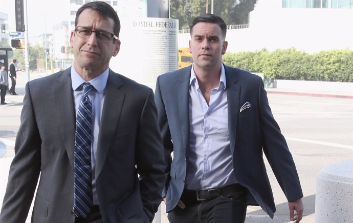 Mark Salling (R) arrives for a court appearance at U