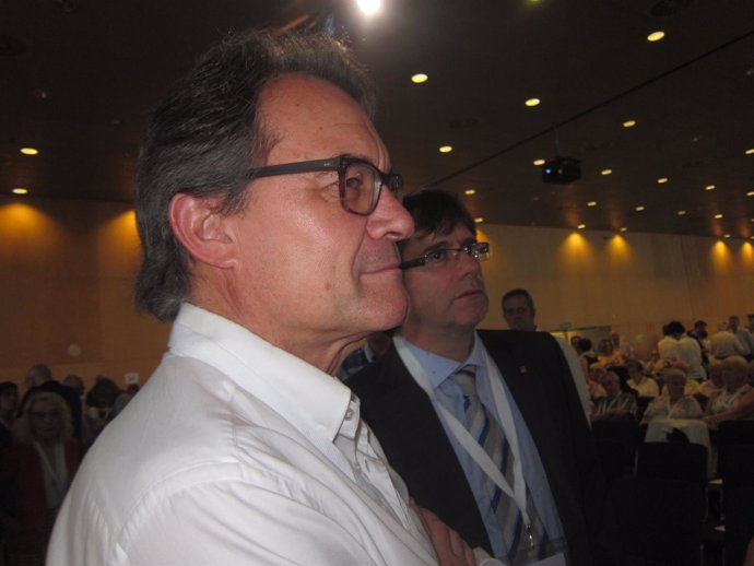 Expte. Y líder de CDC, A.Mas con el pte.C.Puigdemont en el congreso de CDC