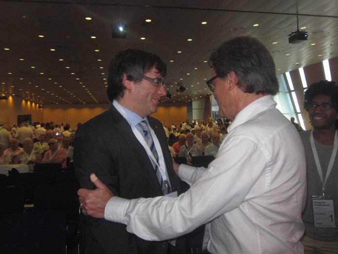 Expte. Y líder de CDC, A.Mas con el pte.C.Puigdemont en el congreso de CDC