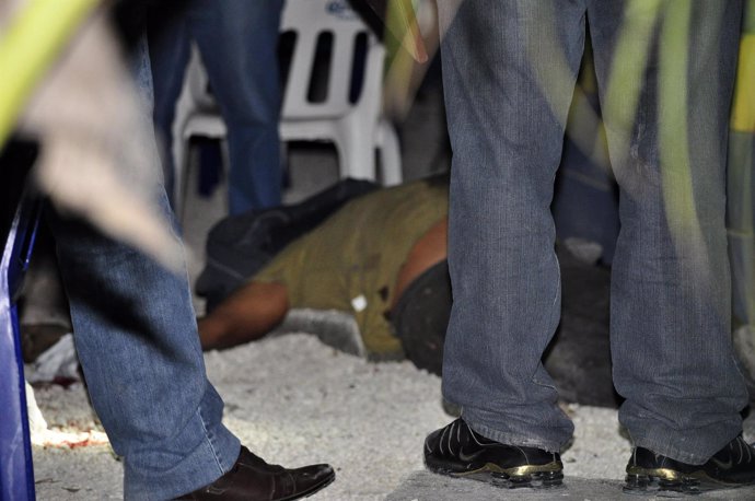 Asesinato, tiroteo en Cancún, México