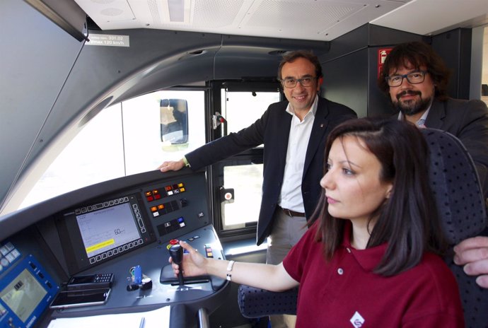 J. Rull y R. Font en un tren de la línea de La Pobla de Segur