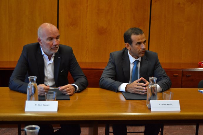 David Mascort y Jaume Masana en la firma del convenio
