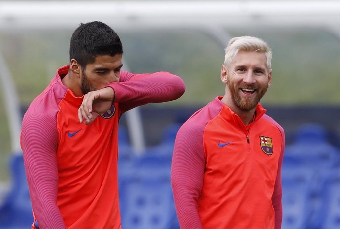 Luis Suárez y Lionel Messi en un entrenamiento de pretemporada