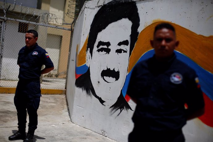Mural, policía, crimen en Venezuela