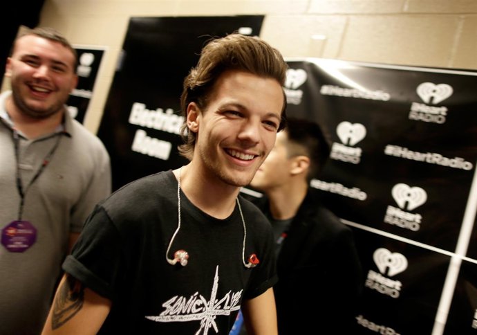 Louis Tomlinson/ Getty