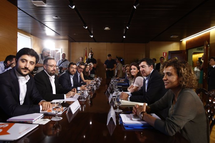 Sesión de negociación entre PP y Ciudadanos para llegar a un pacto de investidur