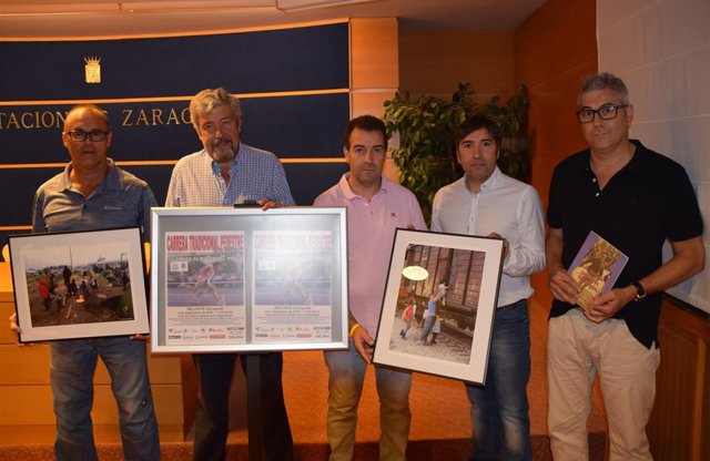 Impulsores y organizadores de la carrera 'de pollos' de Belchite.