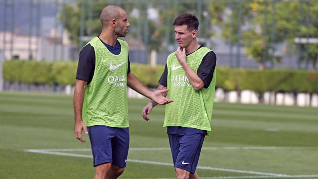 Mascherano y Messi en el entrenamiento del Barcelona