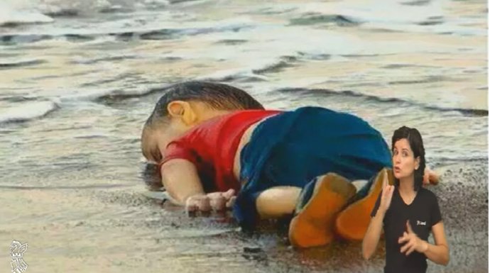 Foto de Aylán mostrada en el pleno del Consell