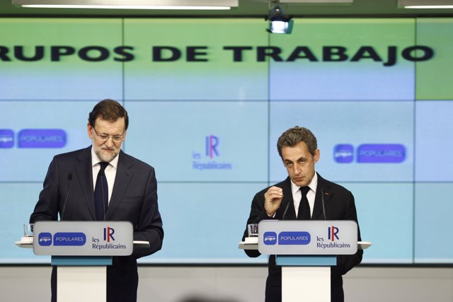Mariano Rajoy y Sarkozy en la sede del PP