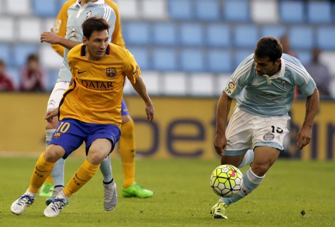  Leo Messi(Barcelona) y Jonny Castro(Celta Vigo)
