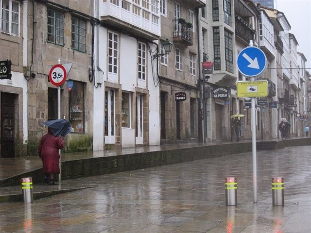 Temporal en Santiago, lluvia, temporal, paraguas, viento