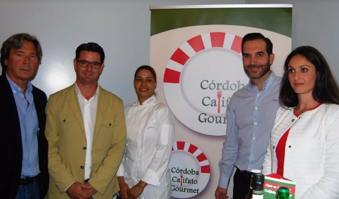García (centro) y Gómez (dcha.), durante la presentación en Madrid
