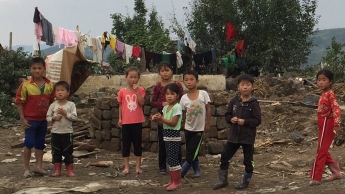 Niños afectados por las inundaciones en Corea del Norte