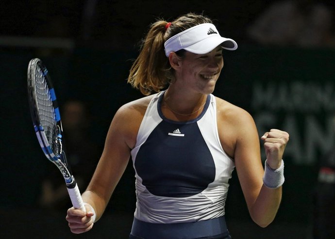 Muguruza celebra su victoria ante Safarova en Singapur