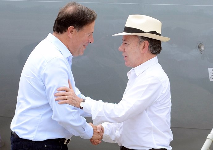 Juan Manuel Santos y Juan Carlos Varela